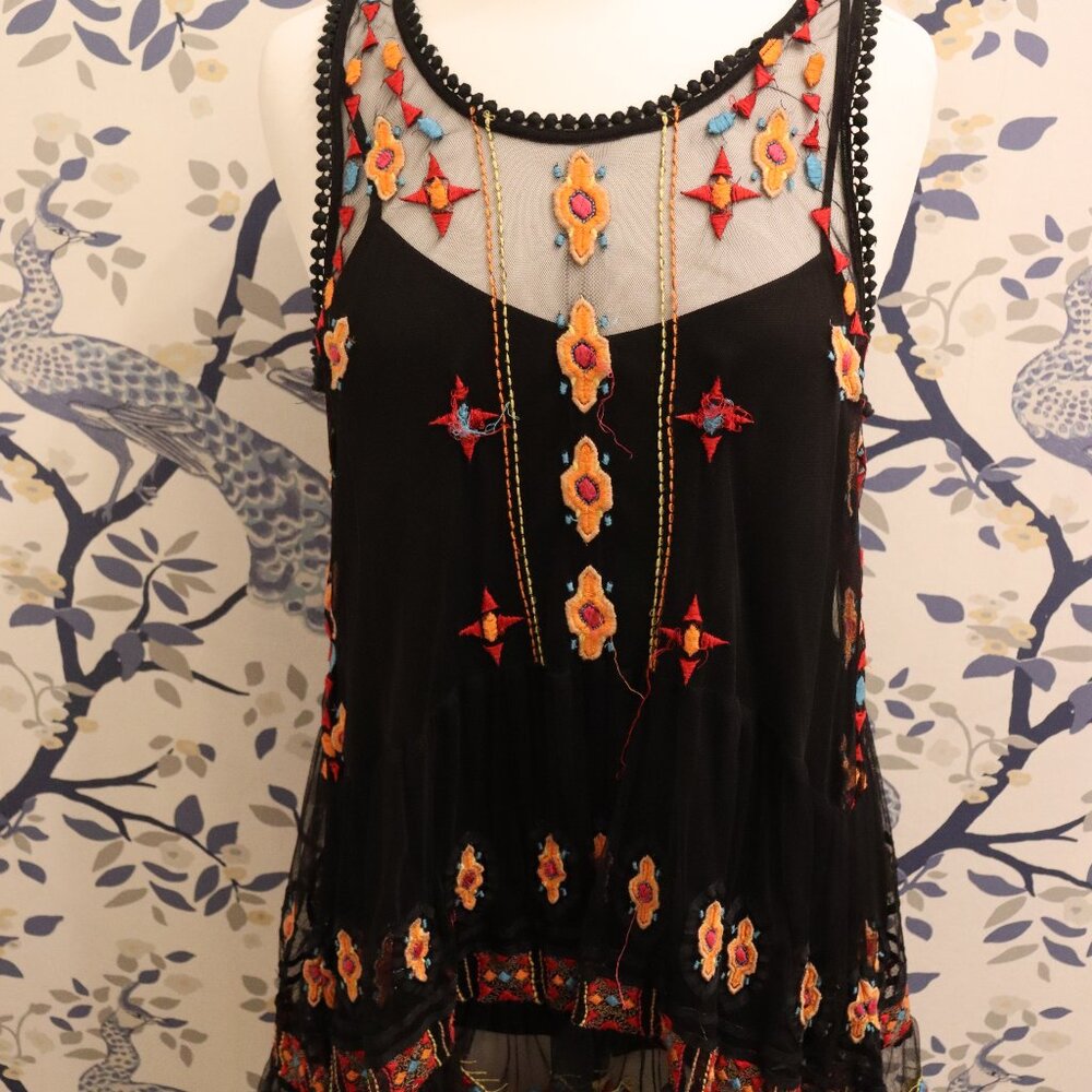 HD in PARIS Aaina embroidered tunic top. Black sheer mesh tunic with vibrant col
